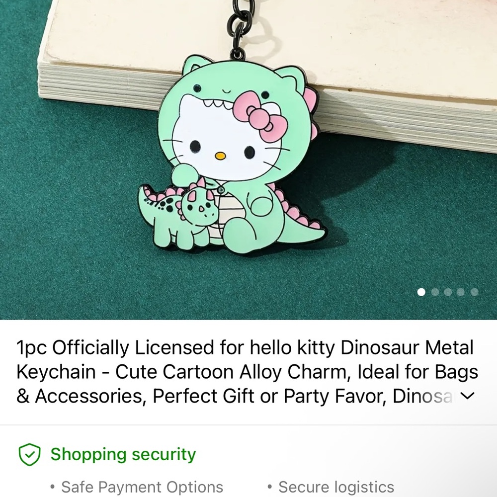 Hello Kitty Green Dinosaur Keychain